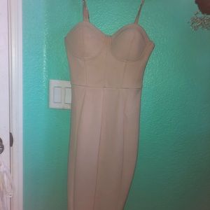 Tight fitting knee length beige dress! :)